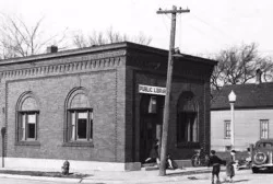 Library in brick building, 1935. Black and white.