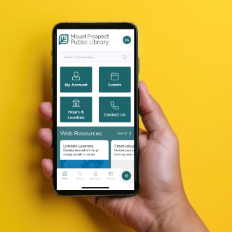 Hand holding a smartphone displaying the app home screen.