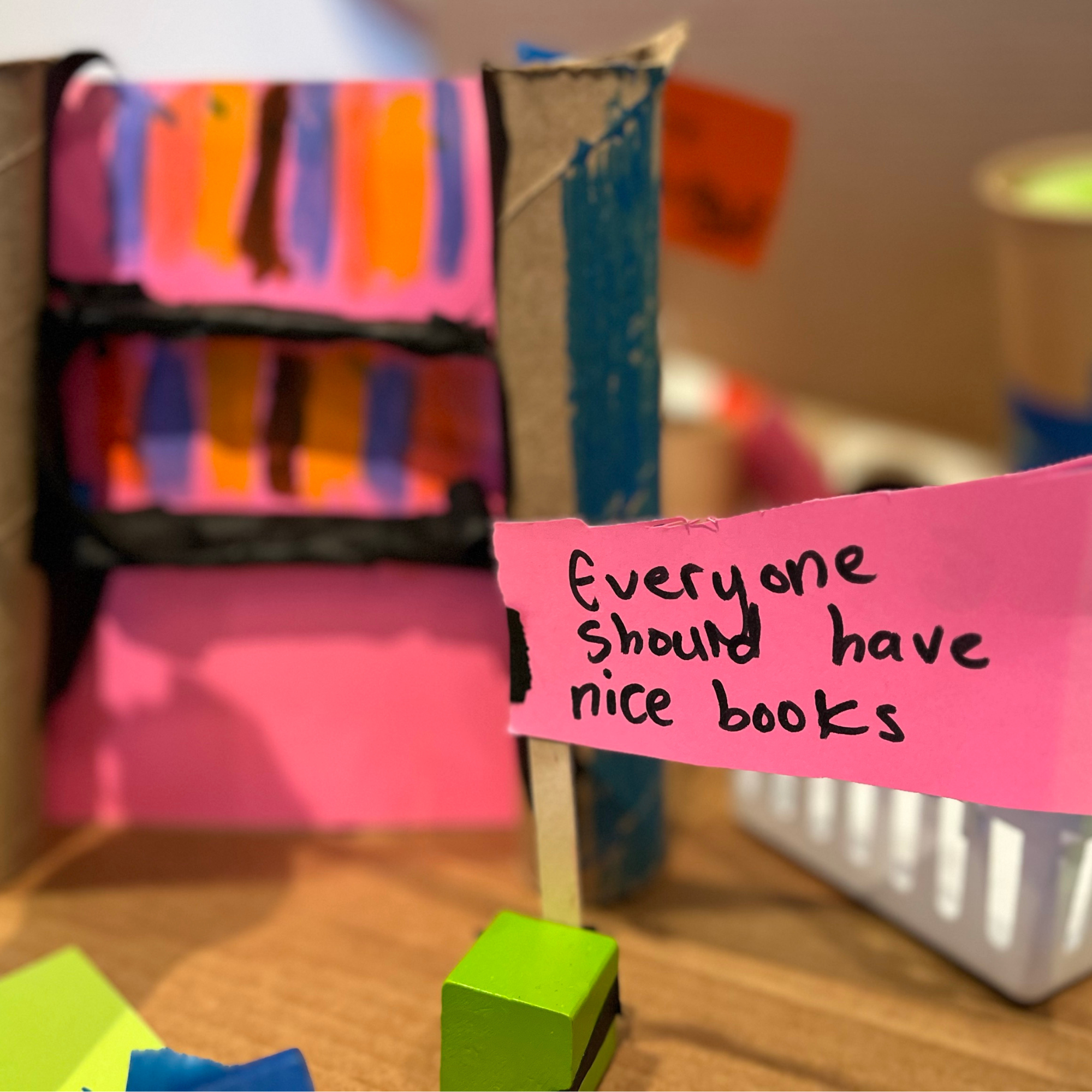 Handwritten flag reads: Everyone should have nice books.