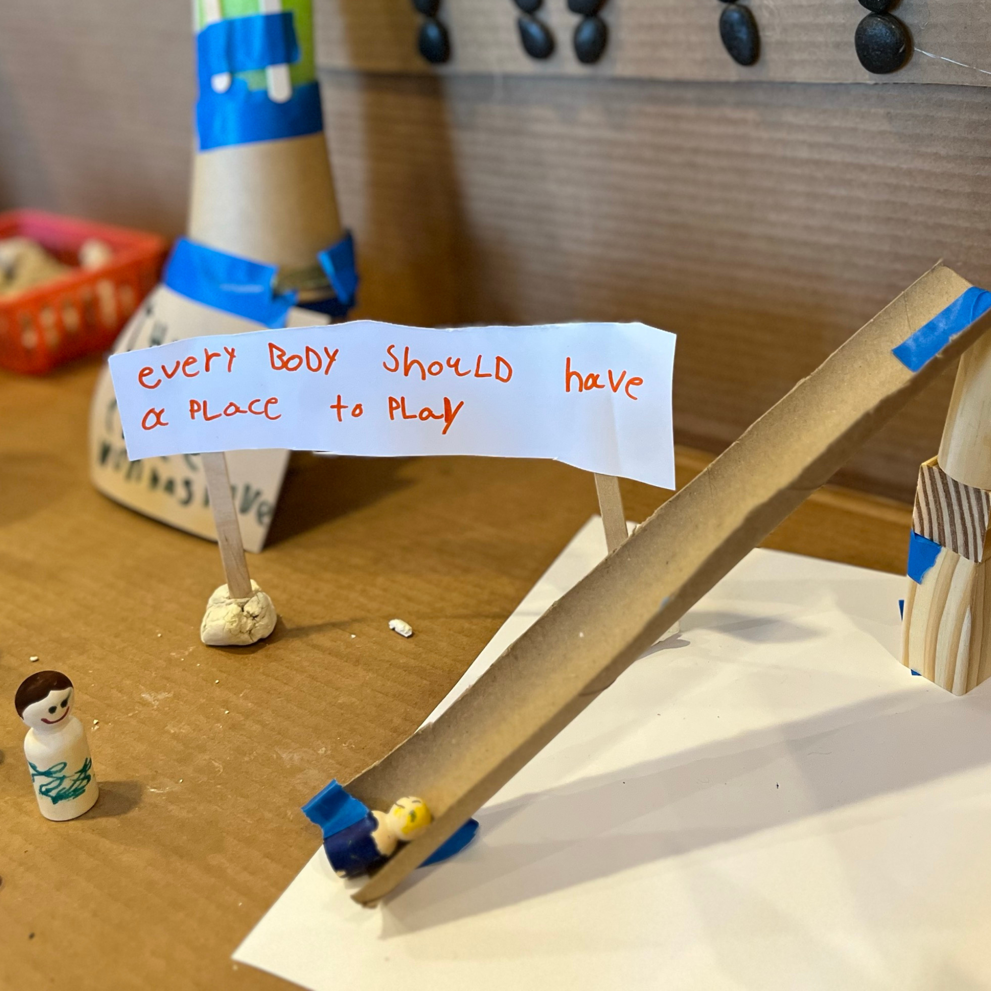 Handwritten flag reads: Everybody should have a place to play.