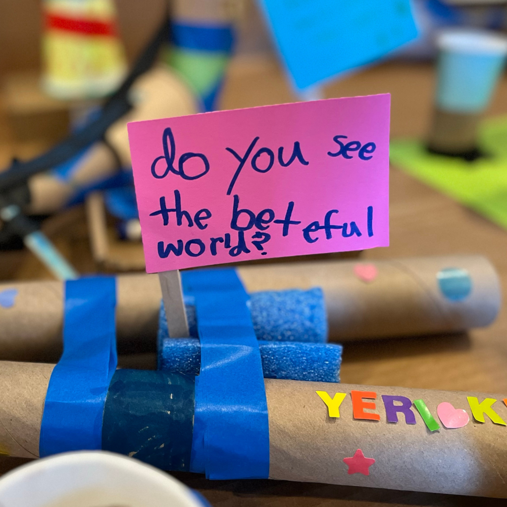 Handwritten flag reads: Do you see the beautiful world?